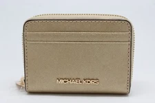 Michael Kors Jet Set Travel Medium Metallic Leather Wallet in Pale Gold
