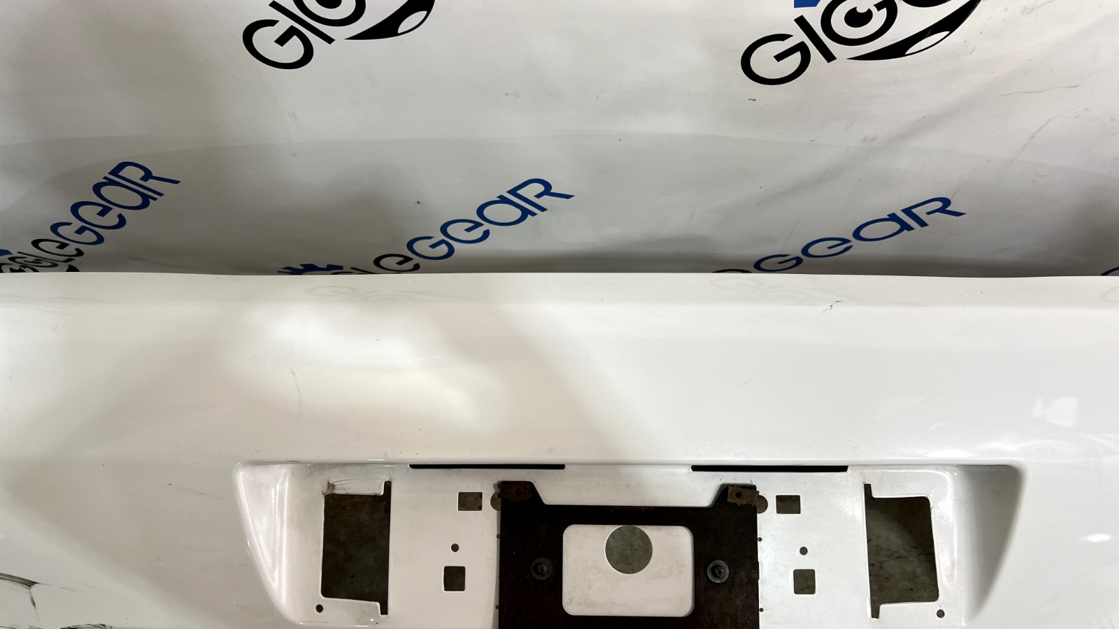 ASTON MARTIN VANTAGE V8 REAR BUMPER 2011 OEM -needs repaired at front edge-
