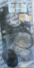 NEW WINDEROSA COMPLETE GASKET SET W/OIL SEALS...