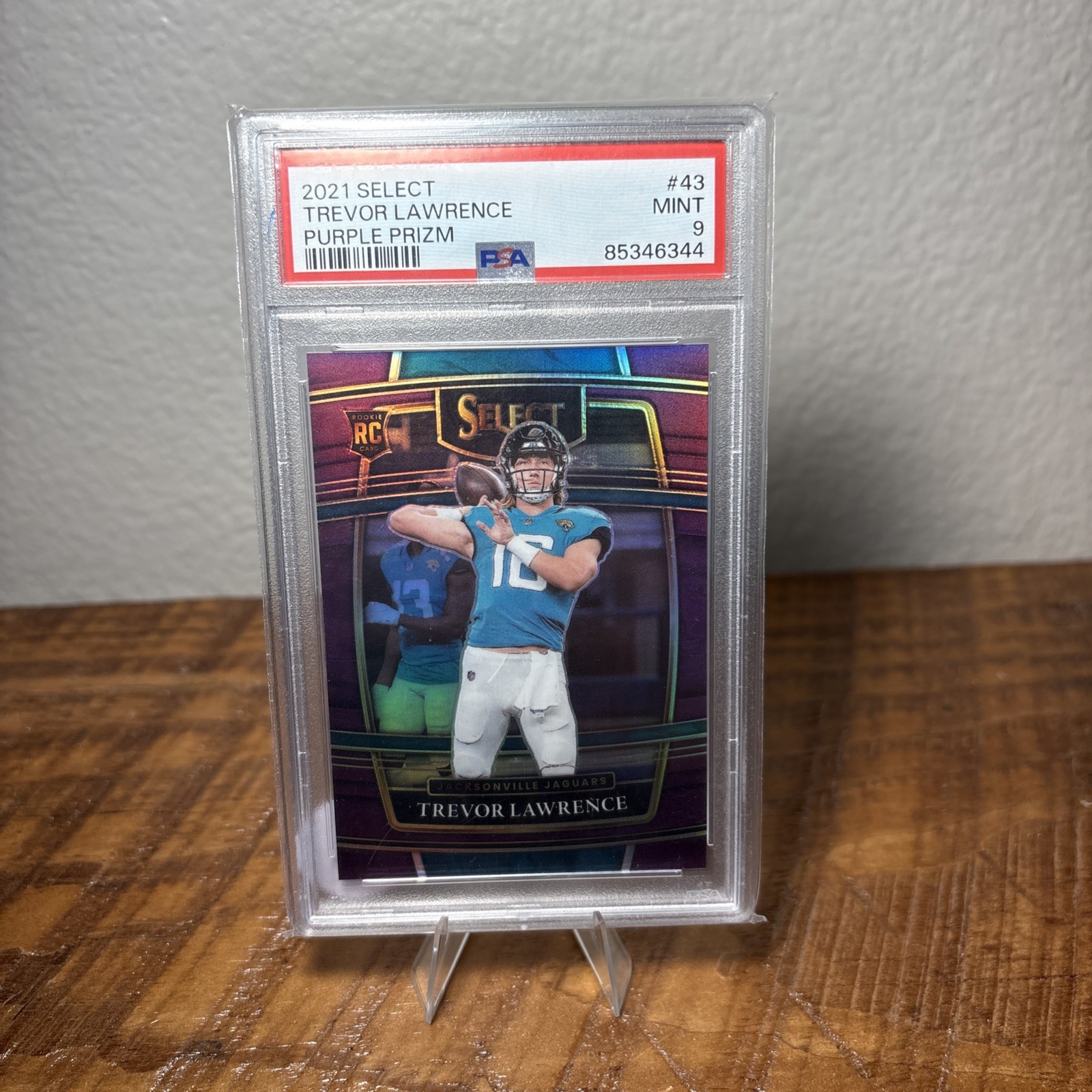 2021 Panini Select - Concourse Trevor Lawrence #43 Purple Prizm /75 (RC)