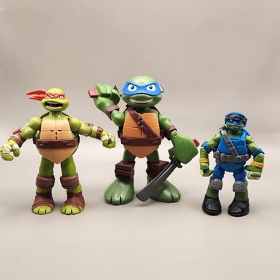 Teenage Mutant Ninja Turtles Michelangelo Leonardo Action Figures Viacom 