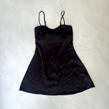 Urban Outfitters Light Before Dark Bella Bow Tie-Back Mini Dress. Black. Medium.