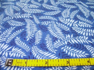 Vintage Feed Sack: White Fern Leaves on Blue Background