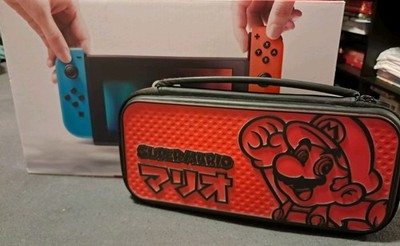 Nintendo Switch Konsole mit Super Mario Tasche und extra Controler Grip