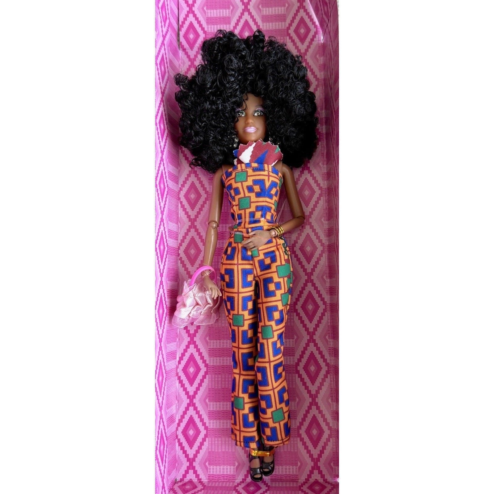 Beautiful African-American Black Barbie doll with natural hair and nice dress