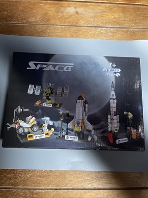 Space Building Block Set With Satellite,Moon Buggy, Space Shuttle, And Rocket.