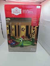 Holiday Time Gator with Gifts Airblown Inflatable Christmas Yard Decor 9ft Wide.