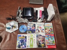 Wii Console plus, 9 games, 2 remotes, 1 nunchuck, System Plus Hookups  More