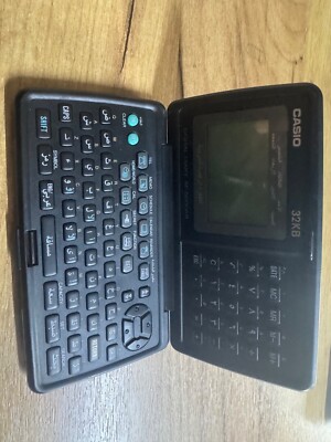 Vintage CASIO Digital Diary SF-5600AR – 32KB – Arabic & English