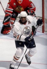 Mike Grier Edmonton Oilers skates on the ice at an NHL game - Ice Hockey Photo 2