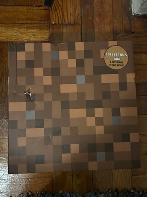 Minecraft Cube Collector Box includes hat, socks, pen, notepad, tumbler, planter