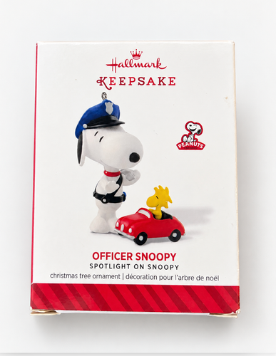 2014 Hallmark Keepsake Officer Snoopy #17 ornament in blue box with red and white Snoopy graphics and peanut brand logo.