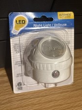 LED Plug in Night Light Sensor Light Warm White Anywhere Adjustable Head