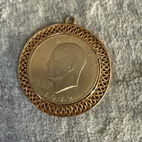 Liberty 1972 one-dollar gold plated coin with frame