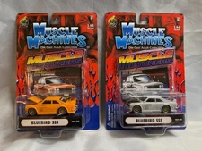 NIB SET OF 2  Muscle Machines Datsun Bluebird SSS T03-52 Orange & T03-58 White 