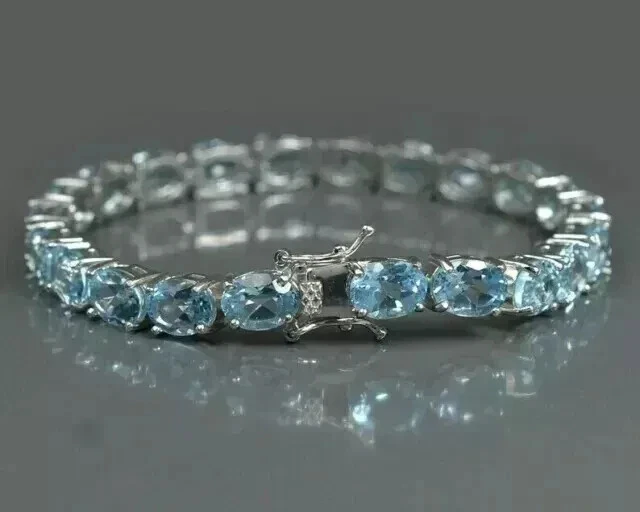 Brazalete Tenis Aguamarina Creado en Laboratorio Corte Ovalado 9Ct Chapado en Oro Blanco 14K Foto 3 de 3