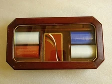 Poker Chips And Cards In A Glass Top Wooden Box