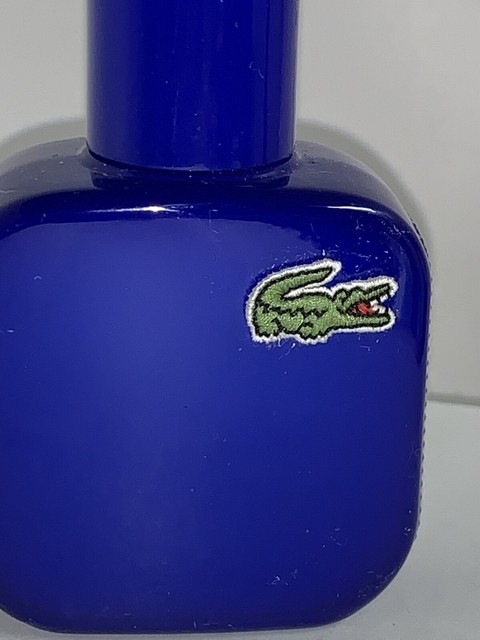 purple lacoste perfume