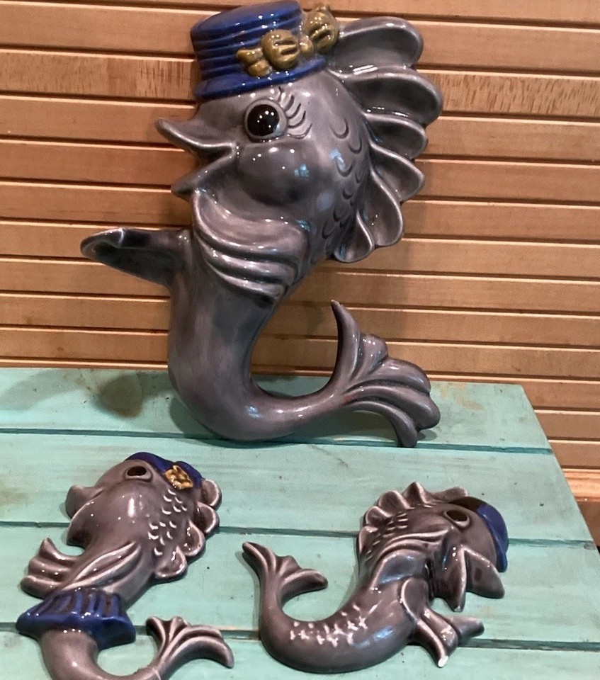 Arnels anthropomorphic fish wall plaques are peak vintage kitsch — a rare set of hand-painted ceramic weirdness that decorators and collectors genuinely hunt for.