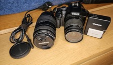 Canon EOS 450D (DSLR) camera with a Canon EF-S 18-55mm f/3.5-5.6 IS zoom lens