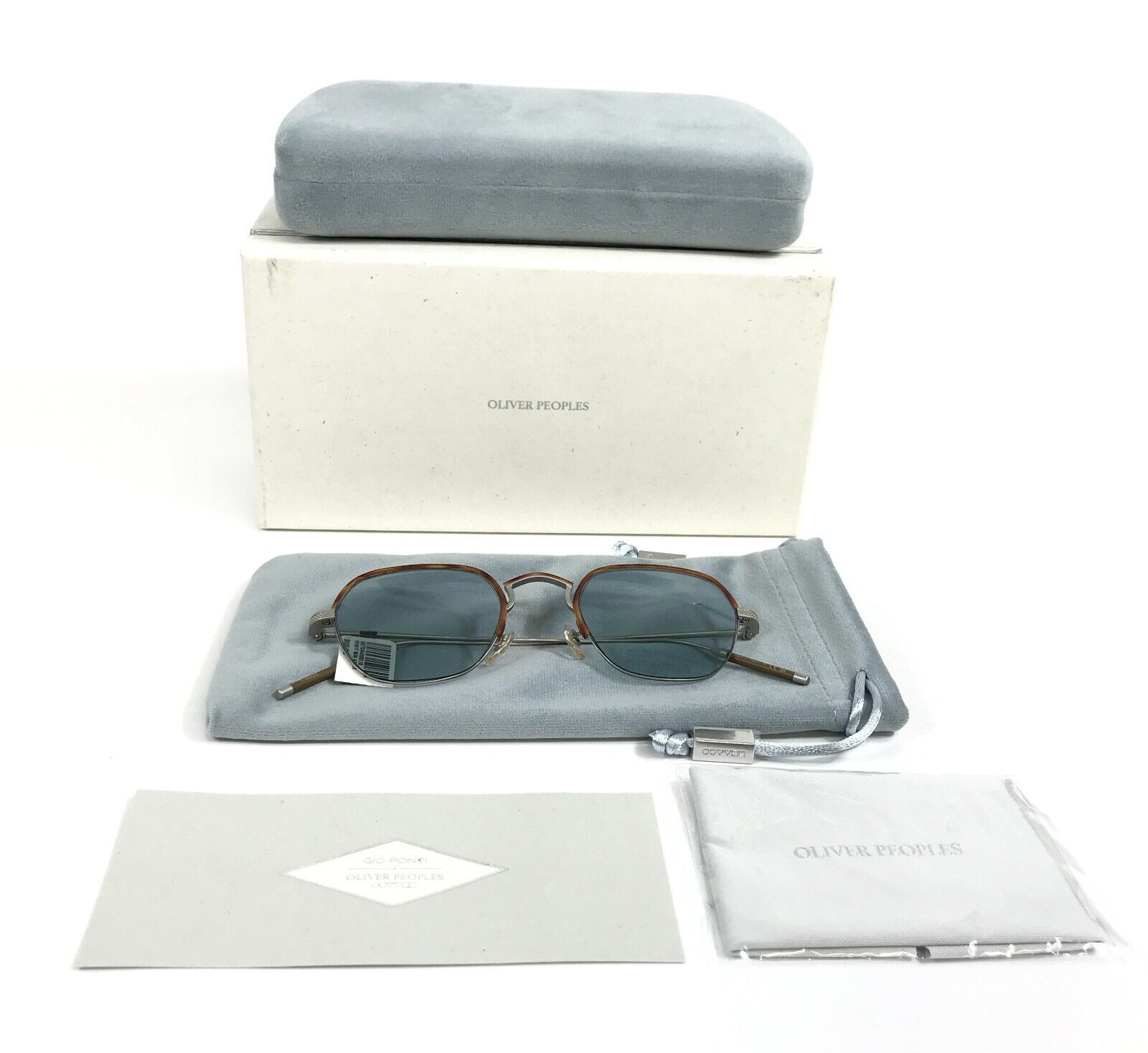 Солнцезащитные очки Oliver Peoples OV1291T 5036 TK-7 Серебристо-янтарно-коричневого цвета с линзой Sea Mist