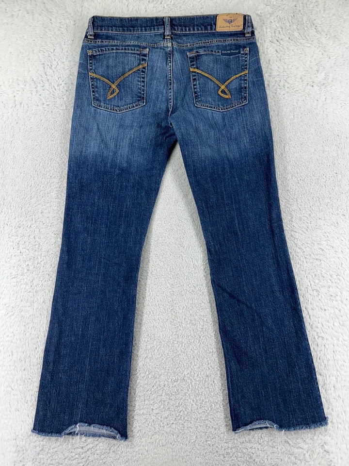 Pantalones de mezclilla Uncharted Territory para mujer 21 azules corte bota mezcla de algodón elásticos Foto 2 de 4