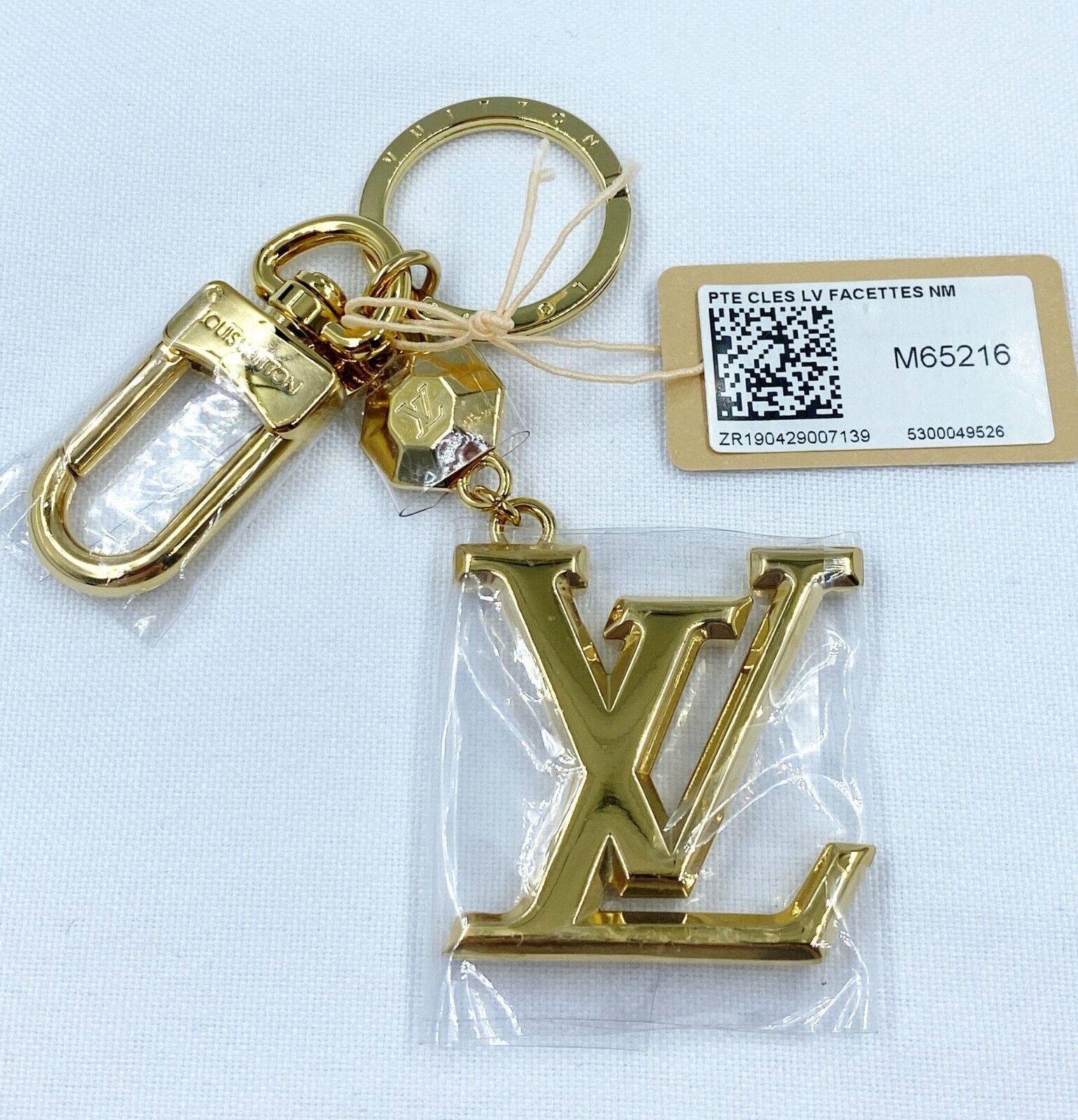 Louis Vuitton Authentic Metal Gold Porte Cles LV Facettes Key Chain Bag  Charm LV