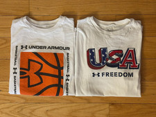 LOT OF 2 BOYS UNDER ARMOUR S/S SHIRTS, WHITE, SIZE YOUTH MEDIUM
