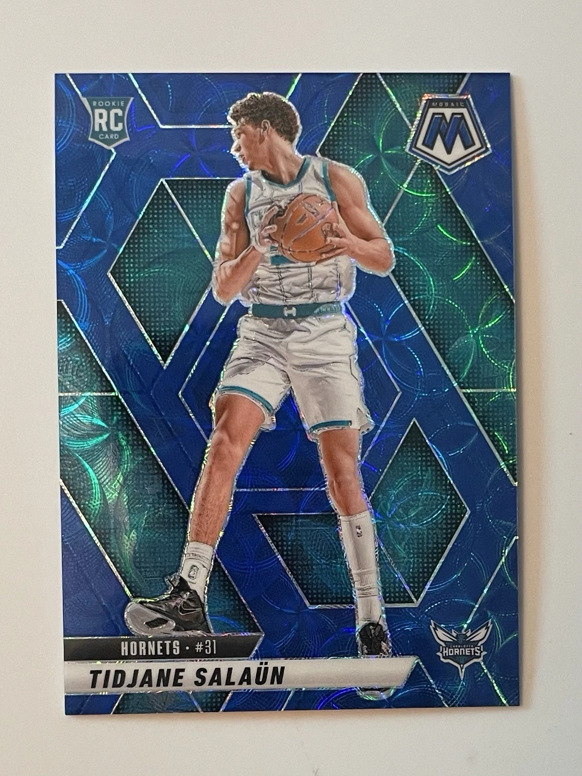 2024-25 Panini Mosaic Tidjane Salaun Blue International /35 #241 Hornets SSP RC