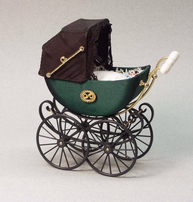 green dolls pram