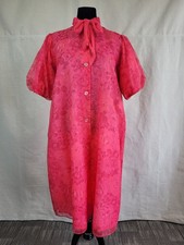 1960s robe in a floral watermelon color, lined with pockets