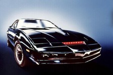 Knight Rider Kit Car Displayed With Red Lights On Glowing Background 24x36 Print