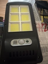 Solar LED Flood Light Outdoor Black Motion Sensor Remote Control Pole Mounted