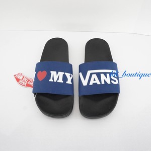 vans multicolor slides