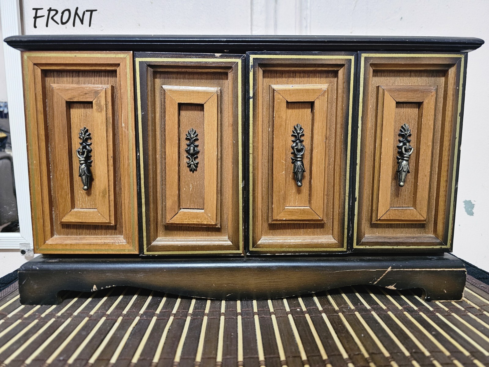 Vintage wooden jewelry box with floral design and velvet lining