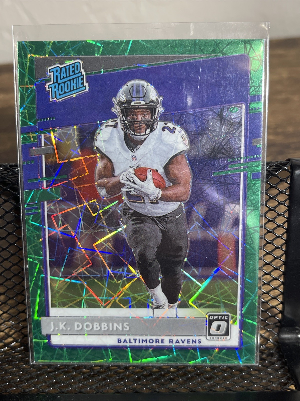 J.K. DOBBINS - 2020 DONRUSS OPTIC FOOTBALL GREEN VELOCITY PRIZM RATED ROOKIE