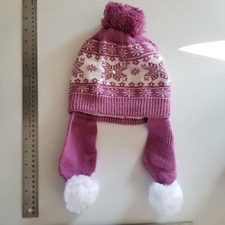 Girls dusty pink knit winter hat with pompoms and fleece lining