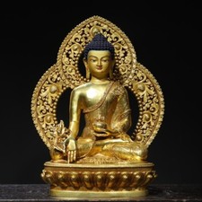 Copper painted backlit statue of Medicine Buddha