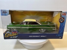 1959 Chevy Impala Diecast Model Car 124 Scale New In The Box By Jada