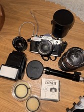 Canon AE-1 35mm SLR Film Camera with Canon 50mm f/1.8 FD Lens  Bundle