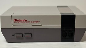 ORIGINAL  NINTENDO NES SYSTEM WITH 21 GAMES AND 2 GAME GENIE BUNDLE.
