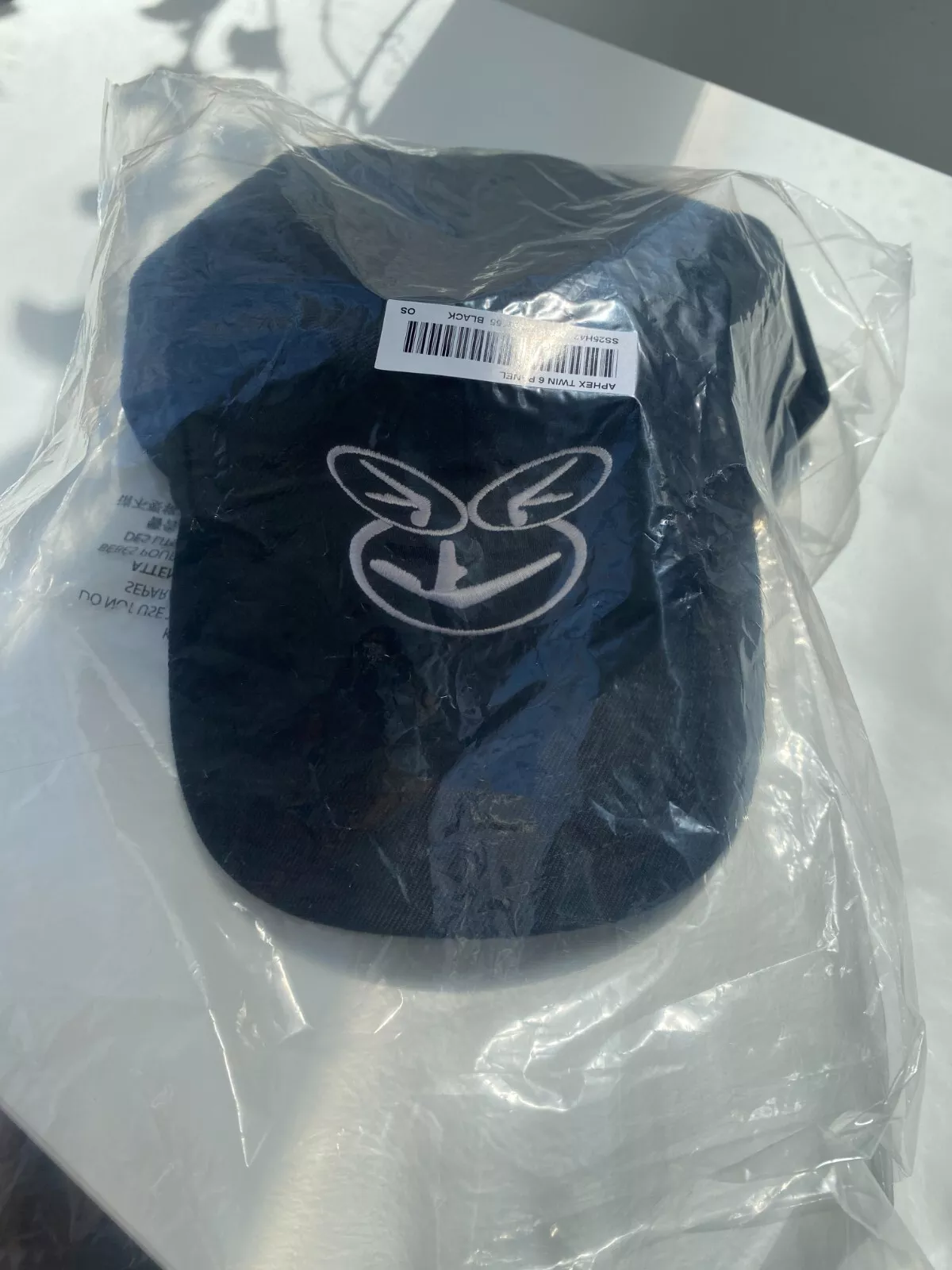 Chapeau noir SUPREME Aphex Twin 6 panneaux