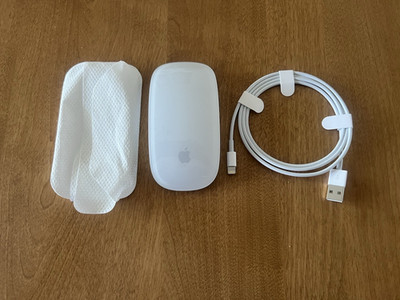 Apple Magic Mouse A1657 Wireless Bluetooth  Never used White  New Charging Cord