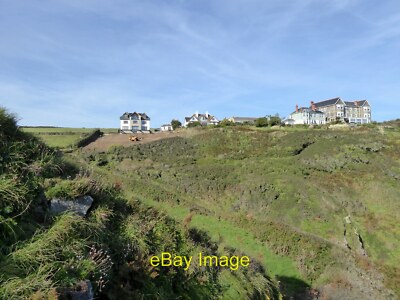 Photo 12x8 Houses at Housel Bay A new house being constructed with an eart c2015