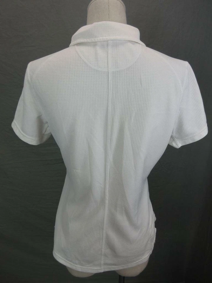 CAMISA POLO ATLÉTICA MUJER THE NORTH FACE BLANCA MANGA CORTA 1/2 CREMALLERA T584 Foto 4 de 4