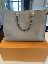 AUTHENTIC Louis Vuitton M45607 Onthego MM  Monogram Empreinte Leather Turtledove