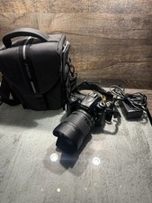 Nikon D90 + Nikkor 18-105 mm kit VR