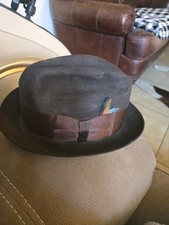 Vintage brown fur felt fedora with a matching Feather