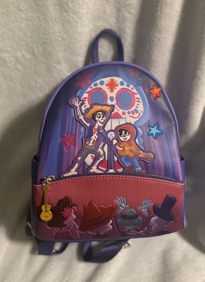 Loungefly Pixar Moments Coco Miguel and Hector Performance Mini Backpack Hardtag