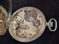 montre à gousset mouvement suisse vintage fonctionne mais retarde
